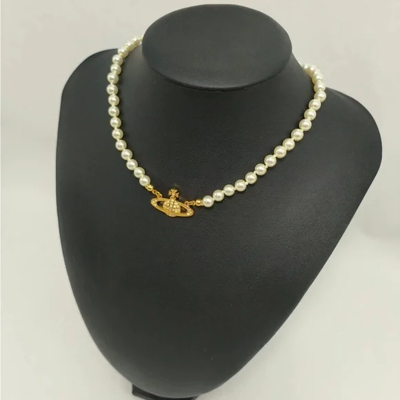 Vivienne Westwood Pearl Necklace with Gold Mini Saturn Pendant